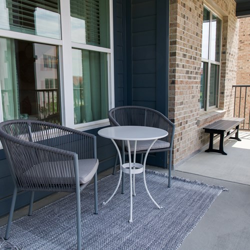 apartment balcony with seating