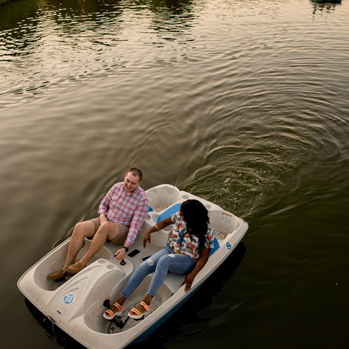 couple on a pedal boat